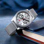 The image features a BERNY watch resting on a book. The watch's sleek design complements the elegant setting, emphasizing its stylish and versatile nature.